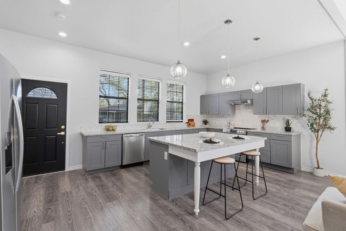 Kitchen with island and pendant lights